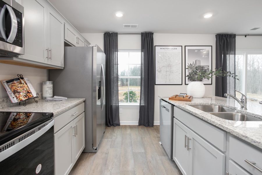 Furnished interior in a model home at Ridge Pointe in Trinity (Image 16).