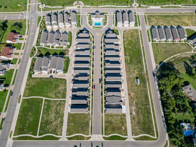 Aerial view of the Heritage Commons community in Andover, KS, showing layout and nearby surroundings (Image 21). Aerial view of the Heritage Commons community in Andover, KS, showing layout and nearby surroundings (Image 21).