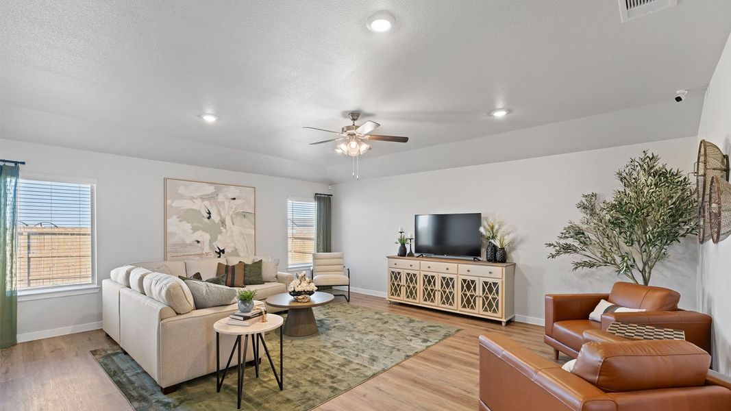 Furnished interior in a model home at King's Landing in Corpus Christi (Image 10).