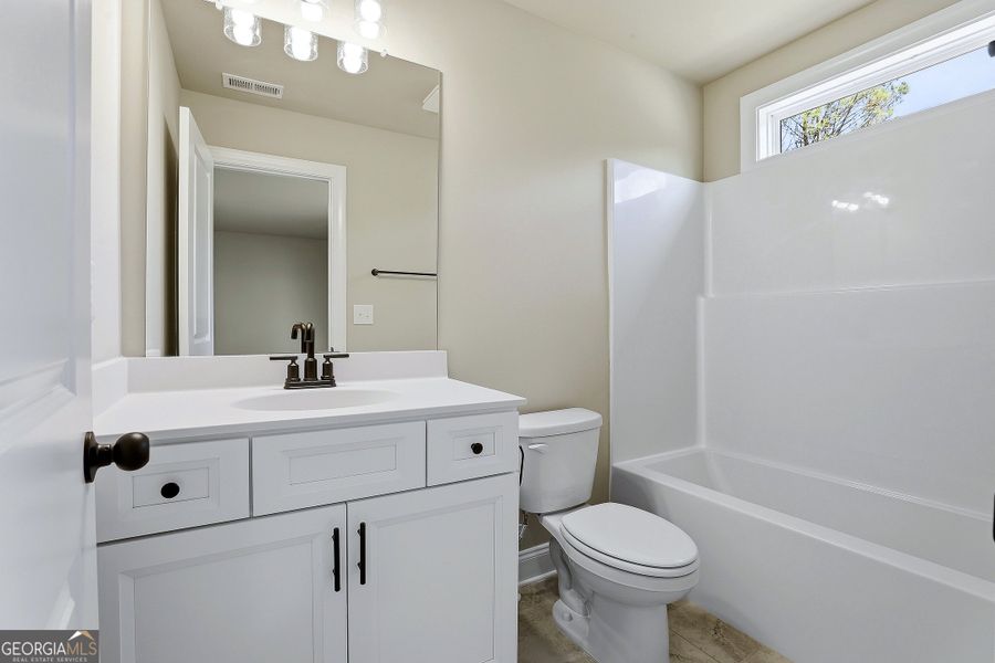 Furnished interior in a model home at Fox Hall Phase V in Senoia (Image 11).