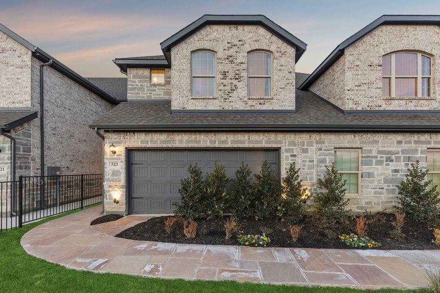 Front exterior of a home in the Main Street Village community, located in Mansfield, TX (Image 27). Front exterior of a home in the Main Street Village community, located in Mansfield, TX (Image 27).