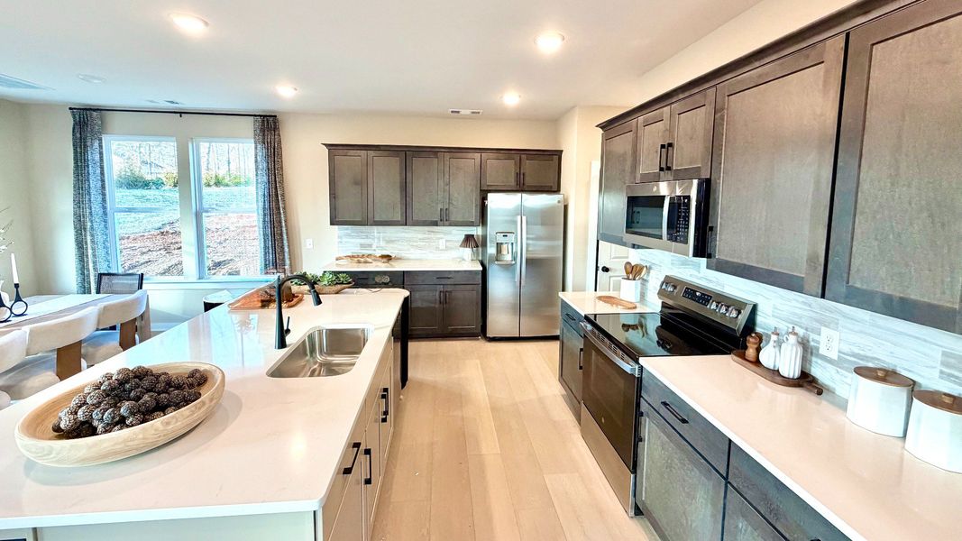 Furnished interior in a model home at Ridgewood in Shelbyville (Image 6). Furnished interior in a model home at Ridgewood in Shelbyville (Image 6).