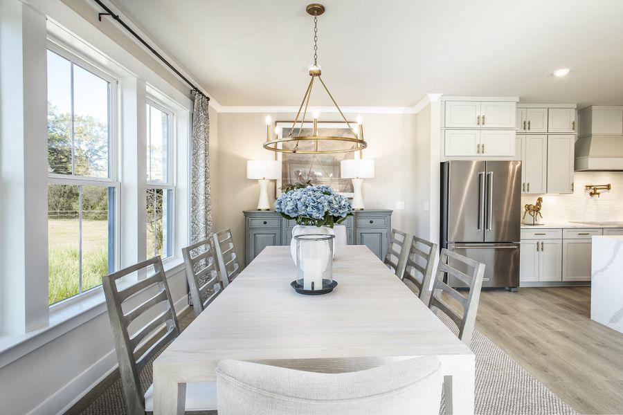 Furnished interior in a model home at The Groves at Myrtle in Roswell (Image 3).