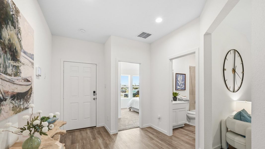 Furnished interior in a model home at Sunterra in Katy (Image 30).