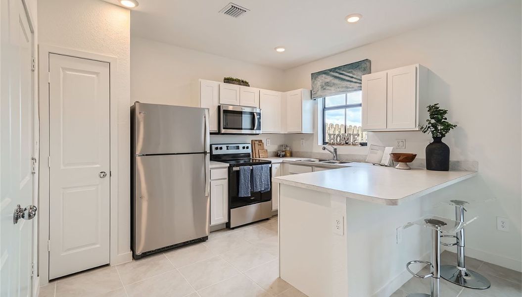 Furnished interior in a model home at Palm Cay in Florida City (Image 25).