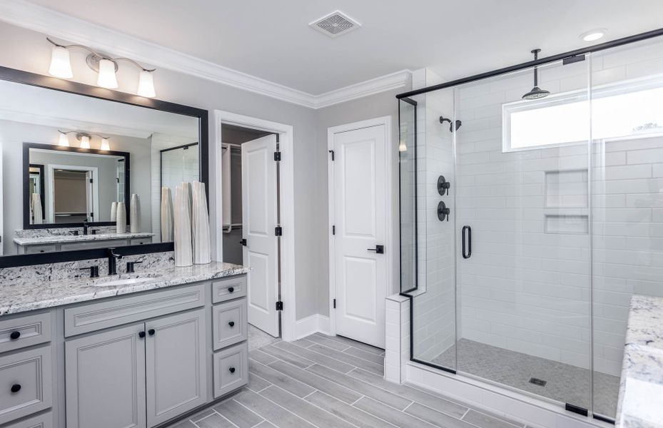 Owner's Bath leads to Walk-In Closet