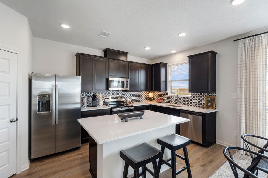 Furnished interior in a model home at Grand Lake in Snook (Image 3).
