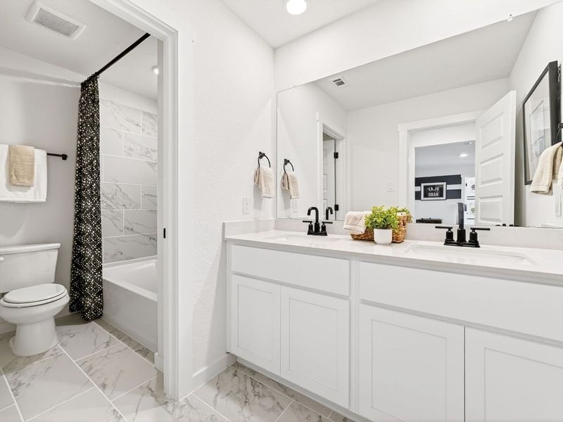 Furnished interior in a model home at Parks at Foster Crossing in Anna (Image 28).
