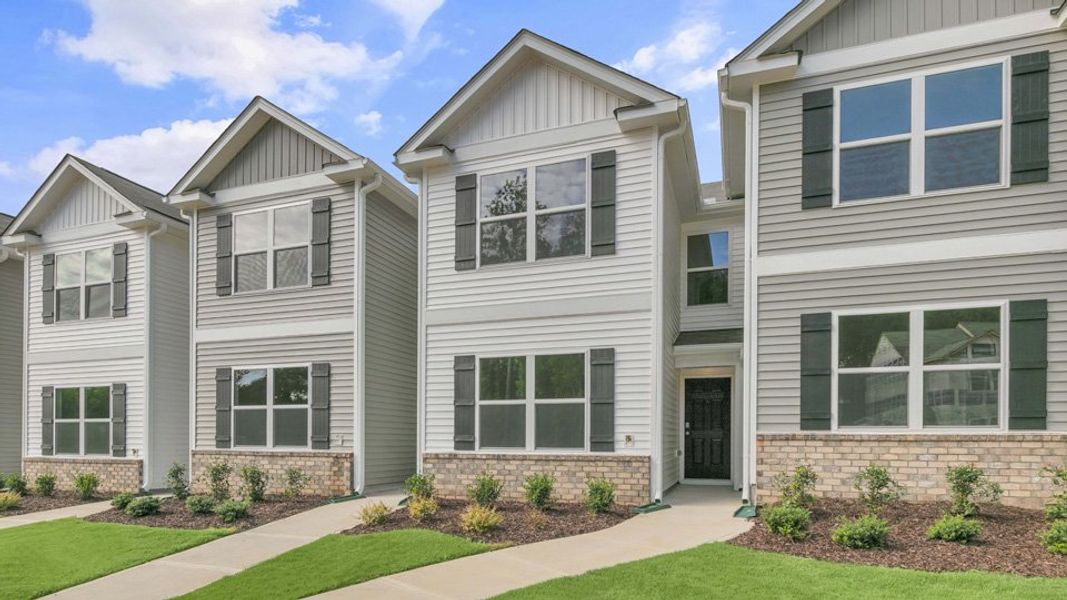 Front exterior of a home in the The Townes at Wilson's Ridge community, located in Wilson's Mills, NC (Image 5).