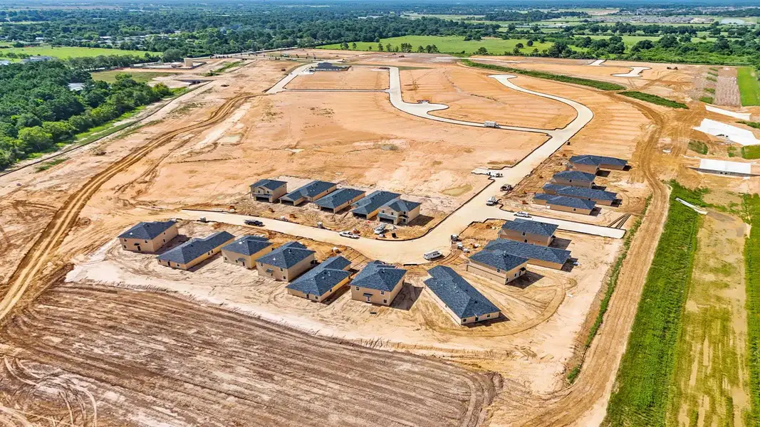 Aerial view of the Sunset Valley community in Hockley, TX, showing layout and nearby surroundings (Image 10).