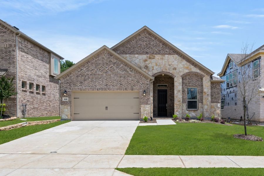 Front exterior of a home in the Walton Ridge community, located in Corinth, TX (Image 2). Front exterior of a home in the Walton Ridge community, located in Corinth, TX (Image 2).