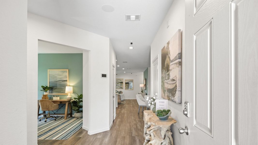 Furnished interior in a model home at Sunterra in Katy (Image 29).