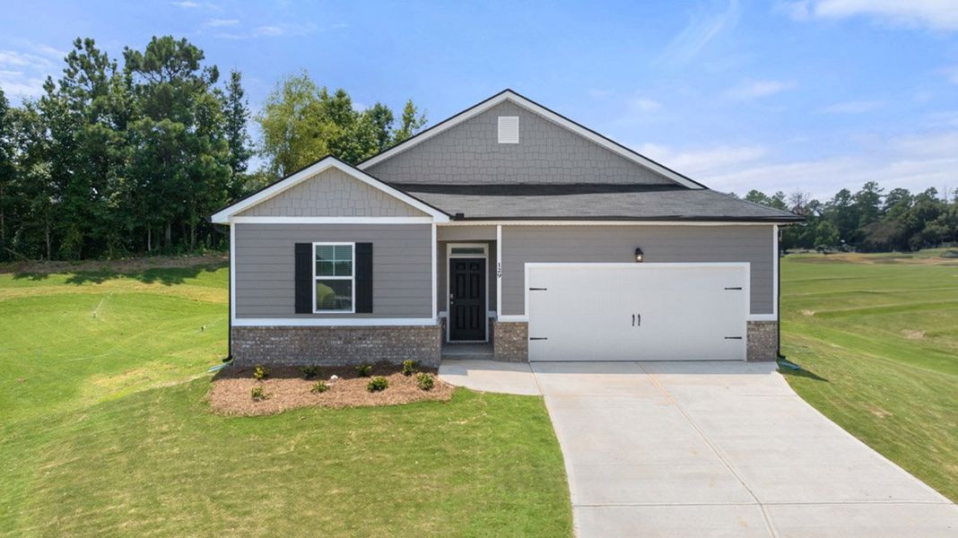 Front exterior of a home in the Cottages at Blue Ridge community, located in Bonaire, GA (Image 10).