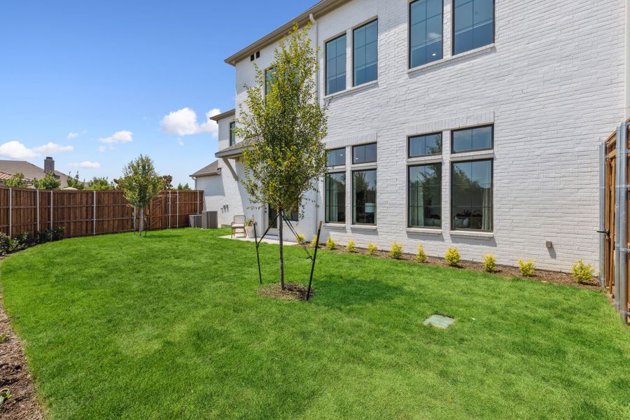 Exterior details of a home in Newman Village Townhomes, Frisco (Image 3).