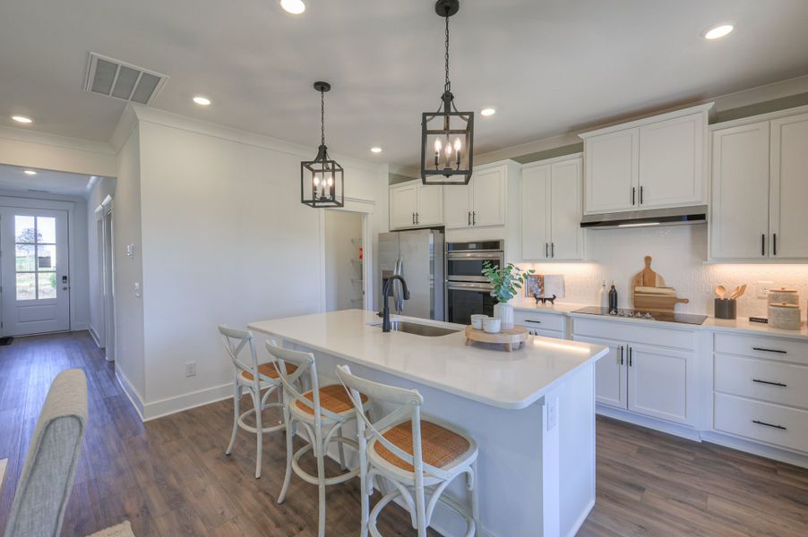 Furnished interior in a model home at Langford Farms in Gallatin (Image 34).