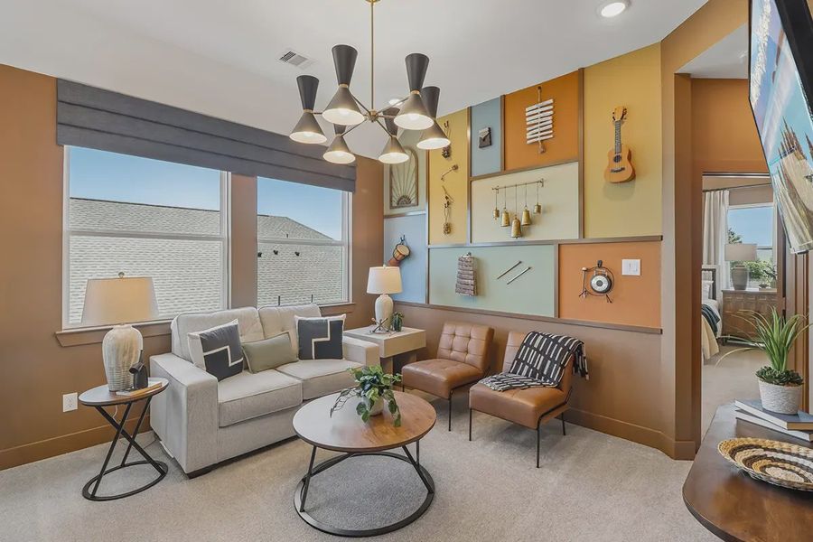 Furnished interior in a model home at Meridiana Chateau in Iowa Colony (Image 4).