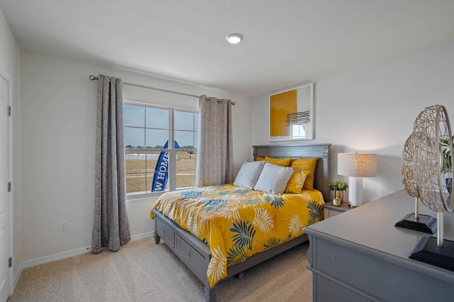 Furnished interior in a model home at Wind Meadows South in Bartow (Image 16).