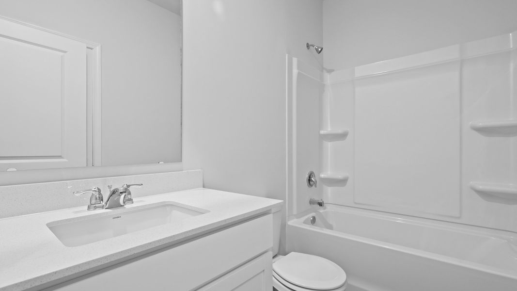 Furnished interior in a model home at Garbon Fields in Summerville (Image 3).