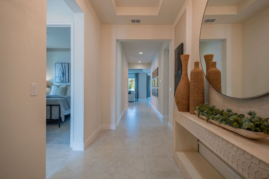 Furnished interior in a model home at Legends Preserve in Daytona Beach (Image 5).