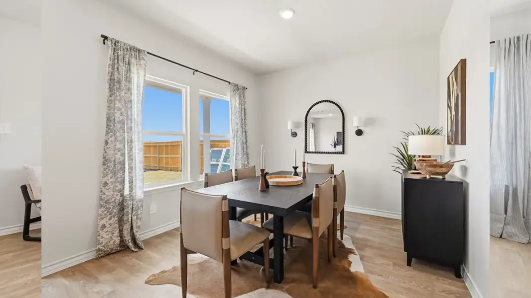 Furnished interior in a model home at Saddle Ridge Estates in Lytle (Image 8).