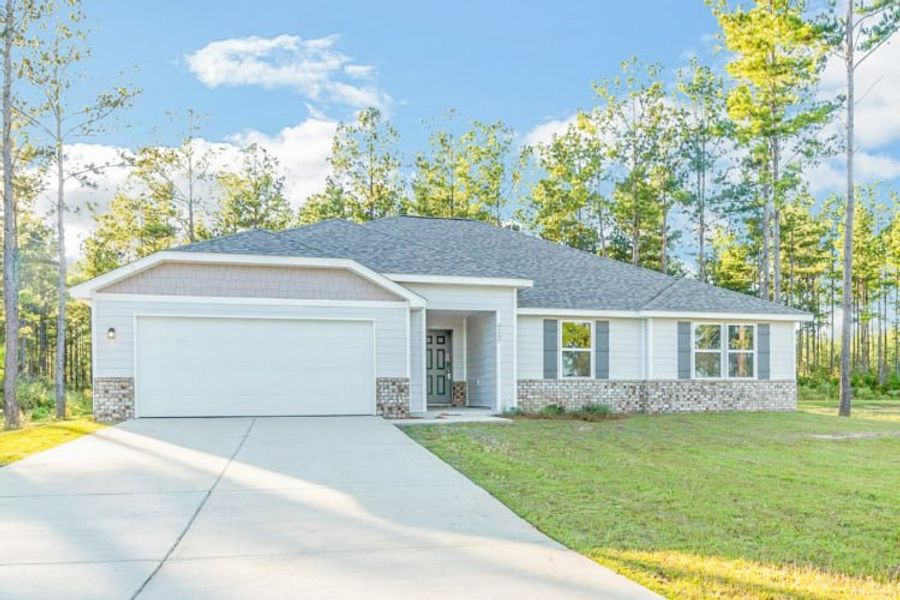 A house with a driveway. A house with a driveway.