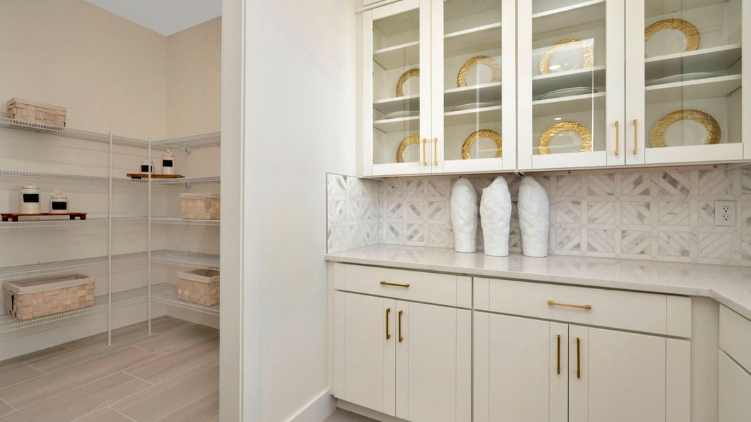 Furnished interior in a model home at Serengeti in Spring Hill (Image 27).