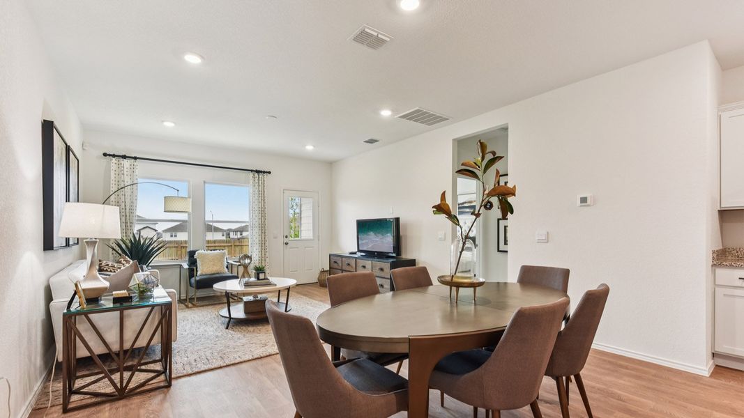 Furnished interior in a model home at Palomino in Manor (Image 10).