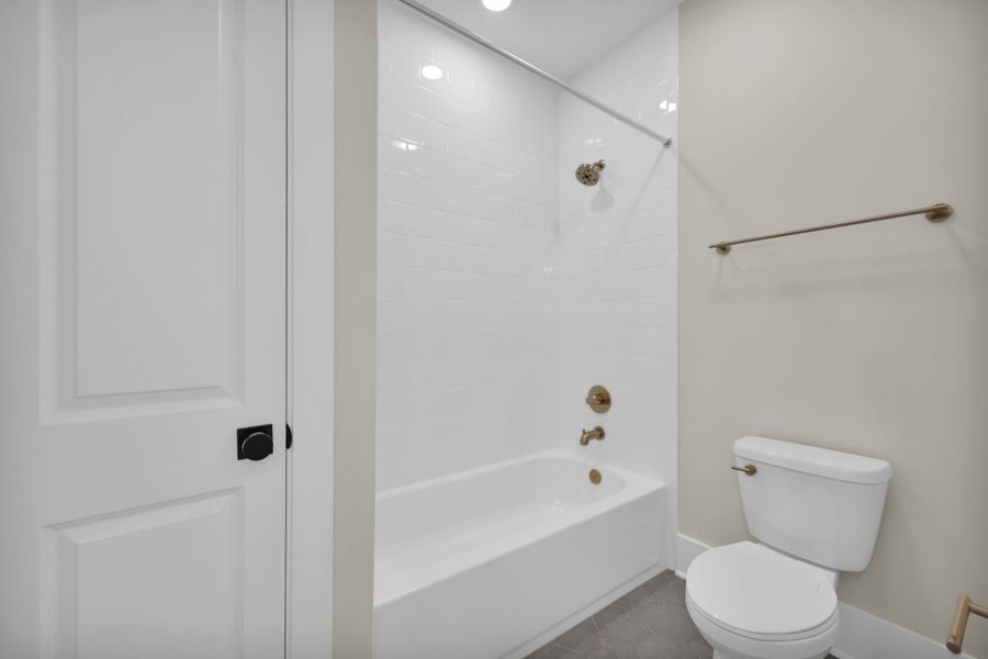 Furnished interior in a model home at Hidden Creek at SilverLeaf in St. Augustine (Image 40).