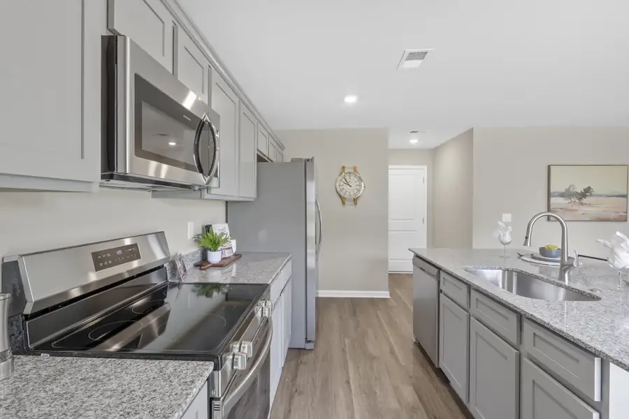 Furnished interior in a model home at Crystal Downs in Sumter (Image 6).