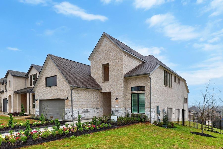Front exterior of a home in the Lakeside at Tessera - 50' community, located in Lago Vista, TX (Image 1). Front exterior of a home in the Lakeside at Tessera - 50' community, located in Lago Vista, TX (Image 1).