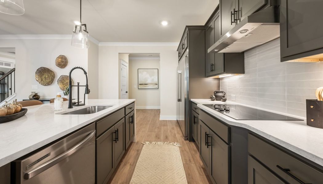 Furnished interior in a model home at Pinecrest Ridge in Dacula (Image 10).