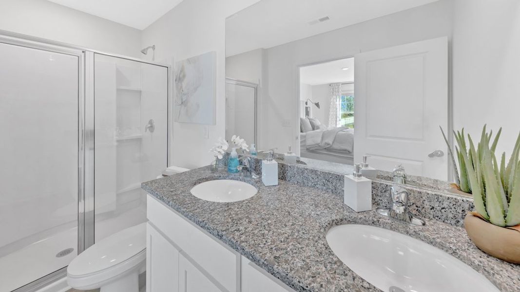 Furnished interior in a model home at Cherokee Crossing in Kodak (Image 27).