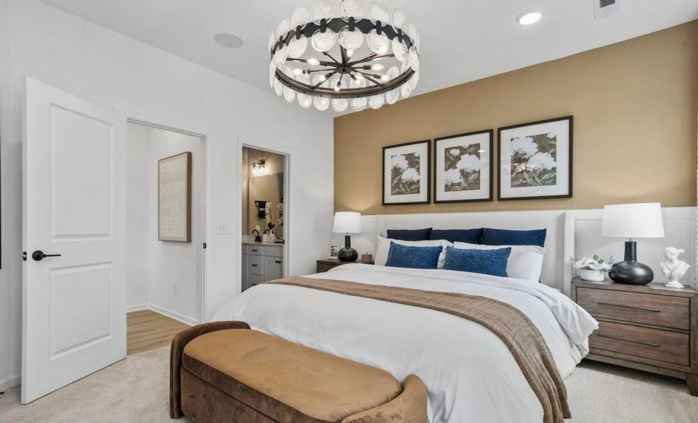 Furnished interior in a model home at CraigStone in Woodruff (Image 8).
