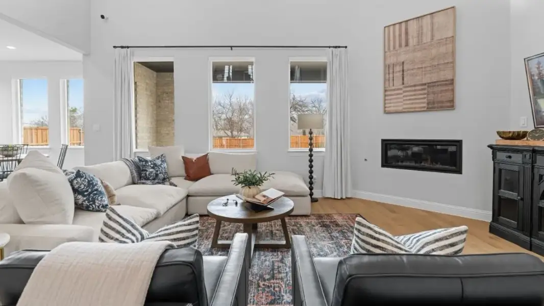 Furnished interior in a model home at White Rock Trail Addition in Dallas (Image 7).