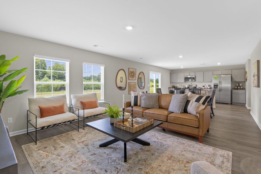 Furnished interior in a model home at Harmon Terrace in Hopkins (Image 18).