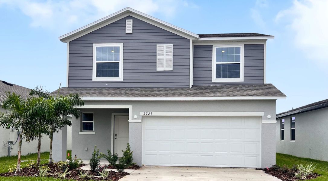 Front exterior of a home in the Port Orange community, located in Edgewater, FL (Image 2).