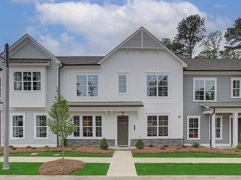 Front exterior of a home in the Ruisseau community, located in Woodstock, GA (Image 4).