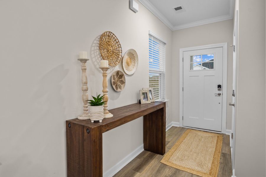 Furnished interior in a model home at The Paired Villas at Bridgewater in Little River (Image 18).