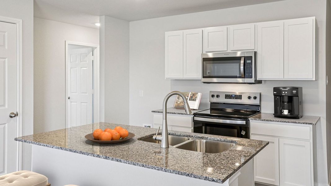 Furnished interior in a model home at The Villages at Schwertner Ranch in Jarrell (Image 7).