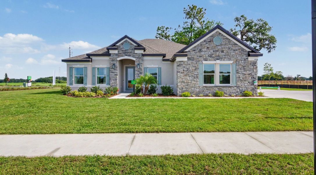 Front exterior of a home in the Bella Estates community, located in Plant City, FL (Image 3).