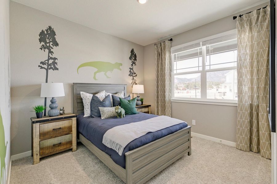 Furnished interior in a model home at Willow Springs Ranch in Monument (Image 17).