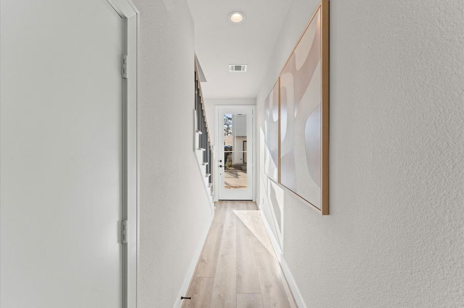 Furnished interior in a model home at Highland Gardens in Houston (Image 18).