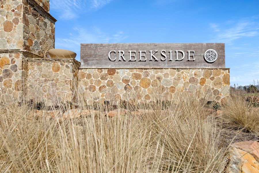 Entrance to the Creekside community in Royse City, TX, featuring signage and landscaping (Image 13).