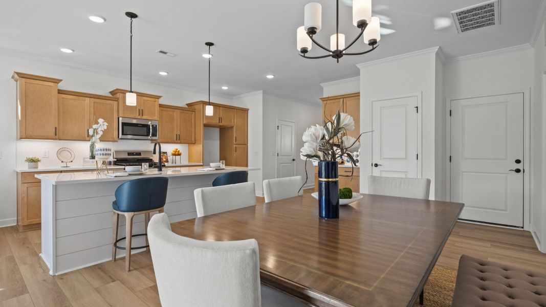 Furnished interior in a model home at Village at Maple Leaf Farm in King (Image 10).