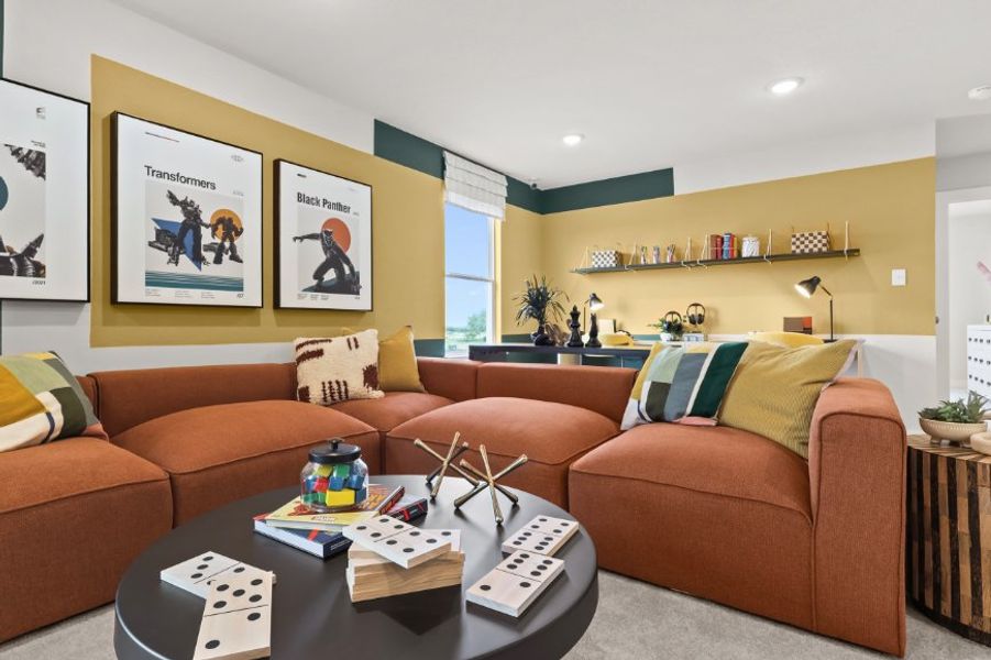 A living room with a couch and a coffee table. A living room with a couch and a coffee table.