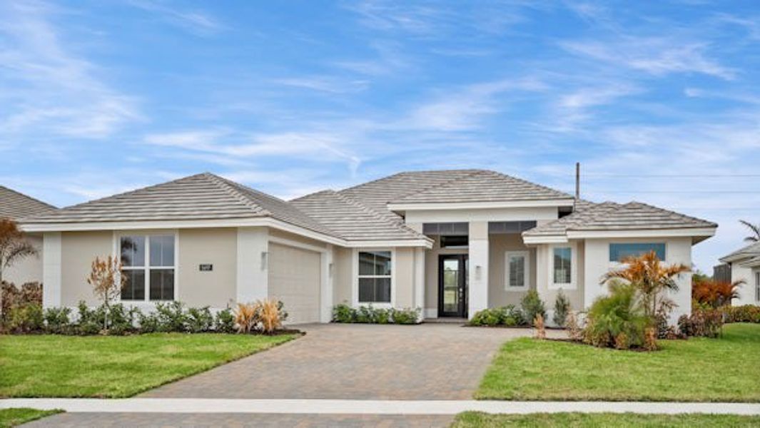 Front exterior of a home in the Bent Pine Preserve community, located in Vero Beach, FL (Image 6).