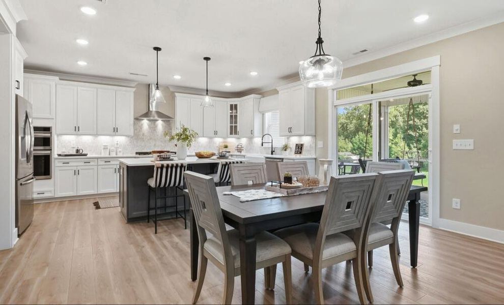 Furnished interior in a model home at Rock Creek in Denver (Image 11).