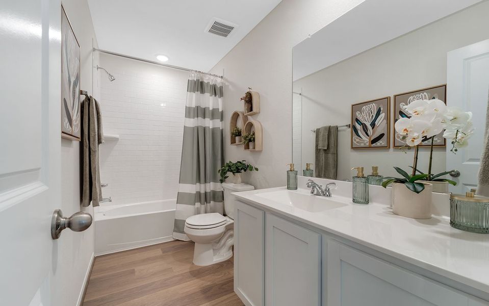 Furnished interior in a model home at Austin Point in Richmond (Image 18). Furnished interior in a model home at Austin Point in Richmond (Image 18).