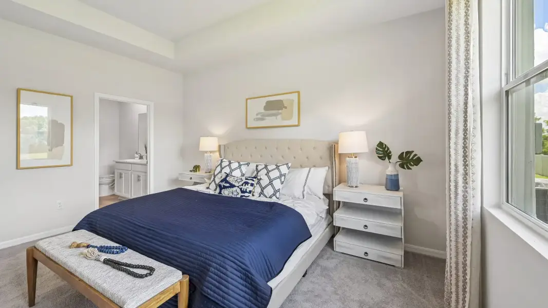 Furnished interior in a model home at Gladstone Park Villas in Sarasota (Image 18).
