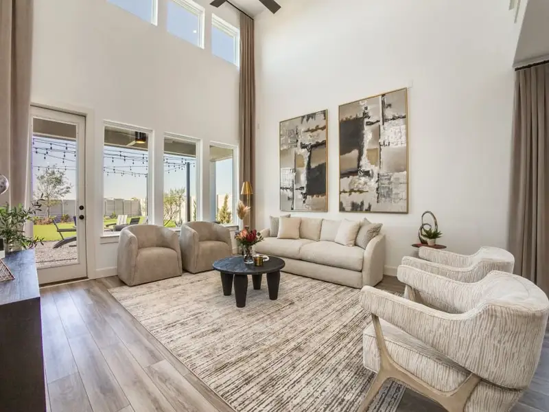 Furnished interior in a model home at Painted Tree - Woodland West in McKinney (Image 26).